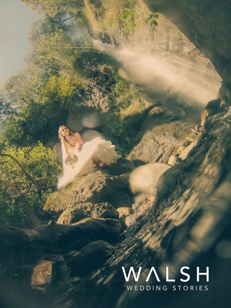 Lake Atitlan Wedding Photographers- bride in finca san buenaventura waterfall