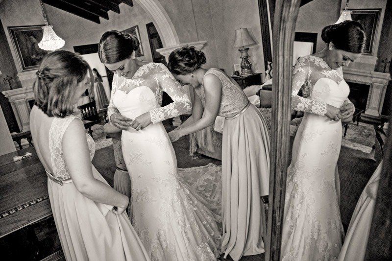 100 (14) Bride getting ready reflected in a mirror at Casa de los Suenos hotel - Antigua Guatemala wedding photographers