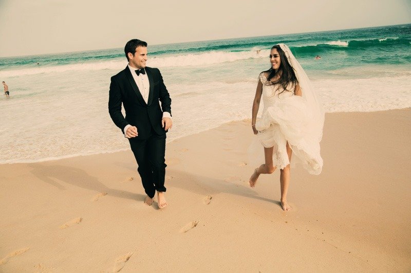 100 (3) Bride and groom running on white sand at Bondi beach - Sydney Australia wedding photographers
