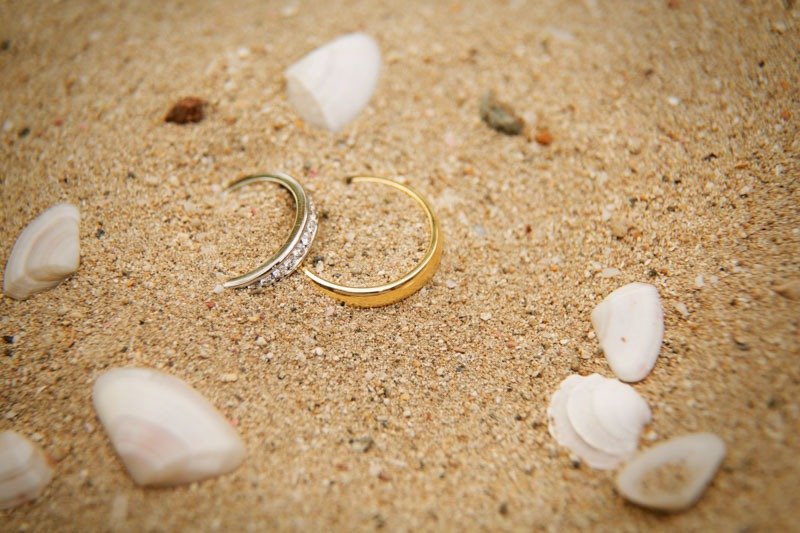 100 (5) Wedding rings in white sand beach with seashells - Antigua and Barbuda caribbean wedding photographers - Carlisle Bay Hotel