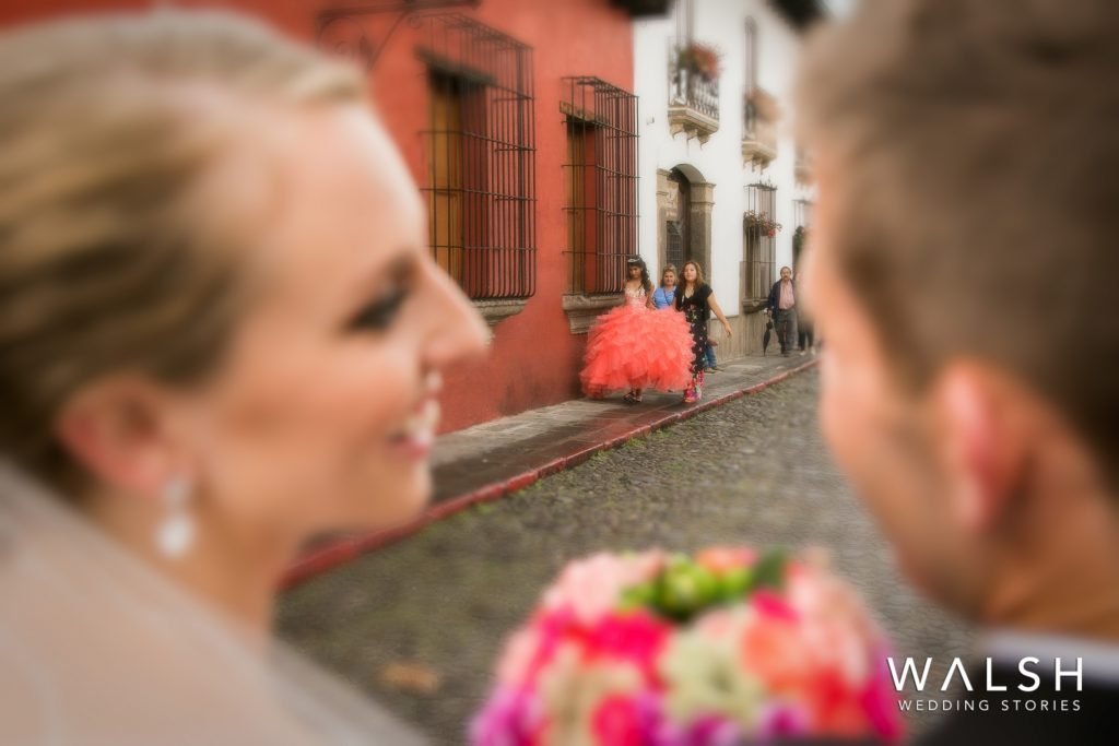 antigua guatemala weddings-bride and groom spotting a quinceañera in antigua