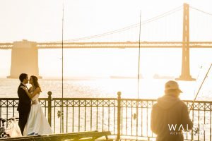 Wedding couple with bay bridge
